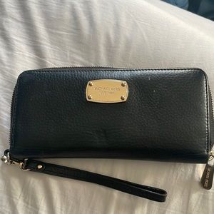 Black and gold Michael kors wristlet